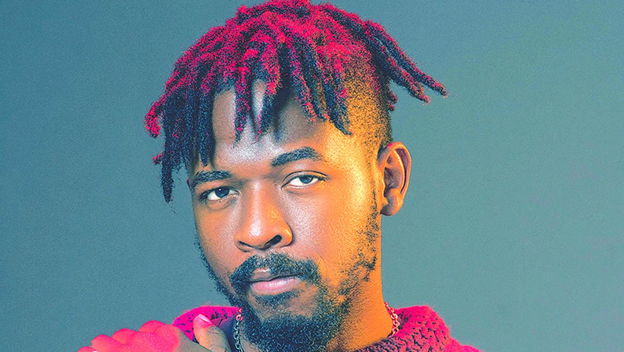 Johnny Drille, a Nigerian fast-rising artiste looking charming with his dreadlocks