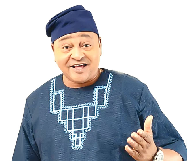 Renowned actor Prince Jide Kosoko beaming in his native Yoruba dress.