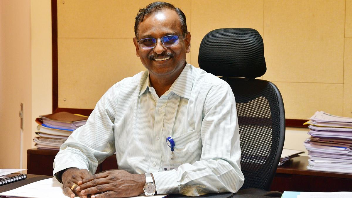 Ever-smiling V Narayanan pictured in office